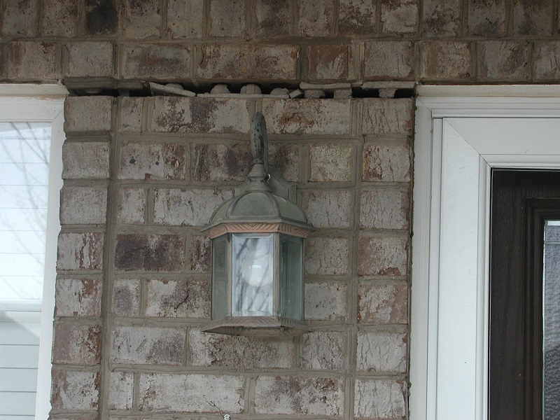This home in Berea was condemned by county officials because of foundation failure, heaving, and broken utility lines related to pyrite oxidation and sulfate formation. 