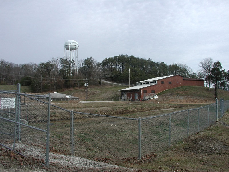 The water treatment plant sustained foundation heaving caused by pyrite oxidation and sulfate formation, threatening the viability of water lines, electric power, and functionality of the plant.