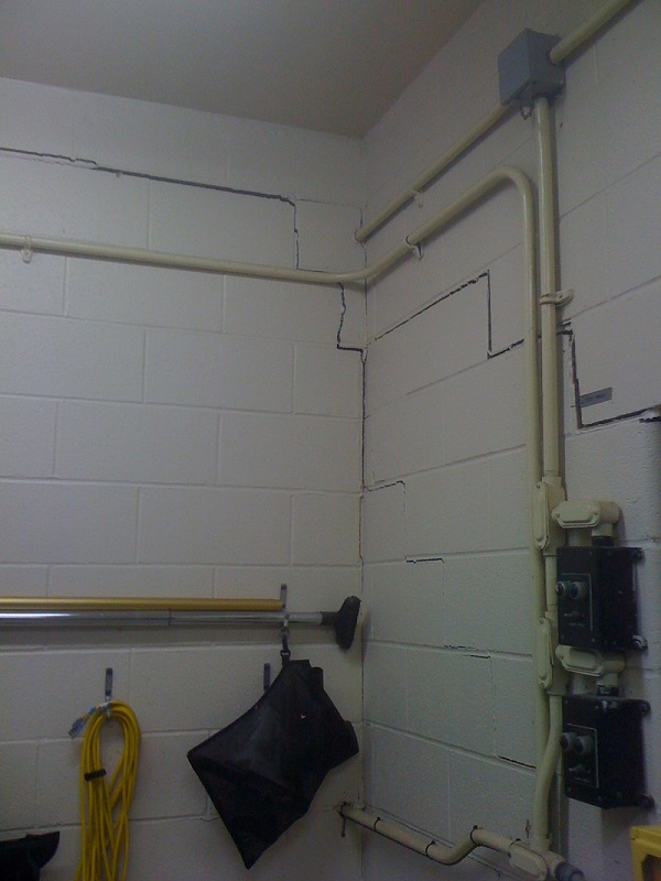 The water treatment plant sustained foundation heaving caused by pyrite oxidation and sulfate formation, threatening the viability of water lines, electric power, and functionality of the plant.