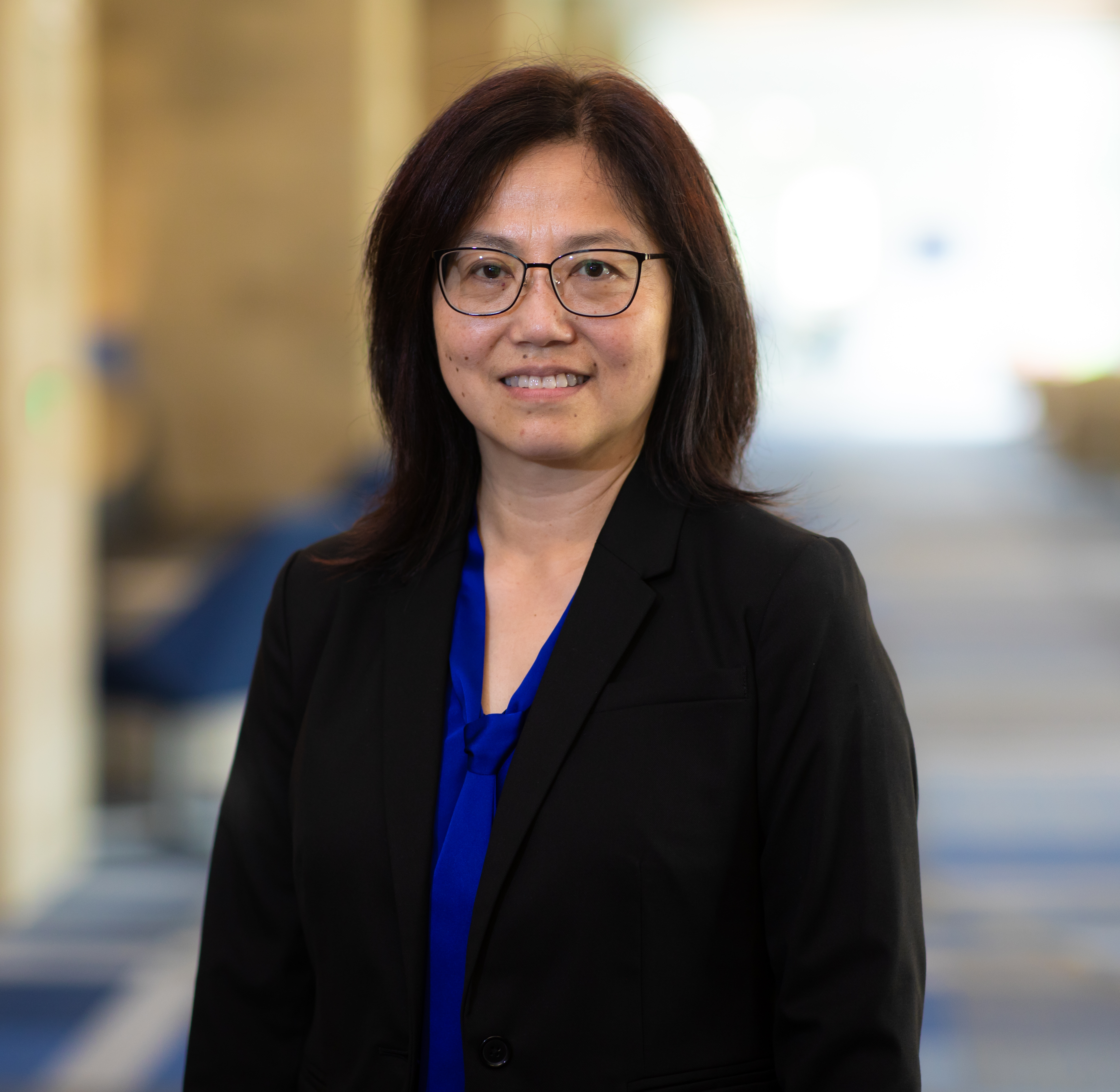 Professional headshot of mei chen